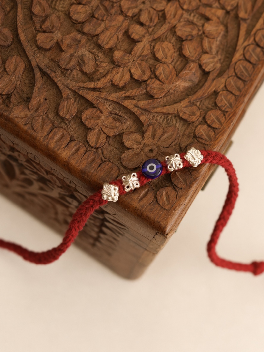 Antique Evil-Eye Luxury Silver 92.5 Bhai Rakhi