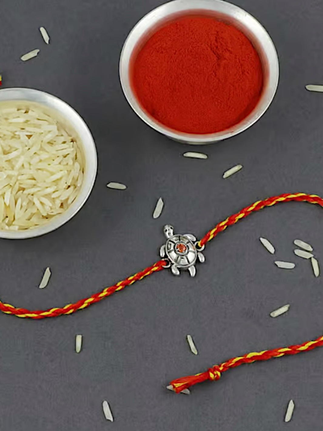 Special Tortoise Moli Rakhi with Red Stone