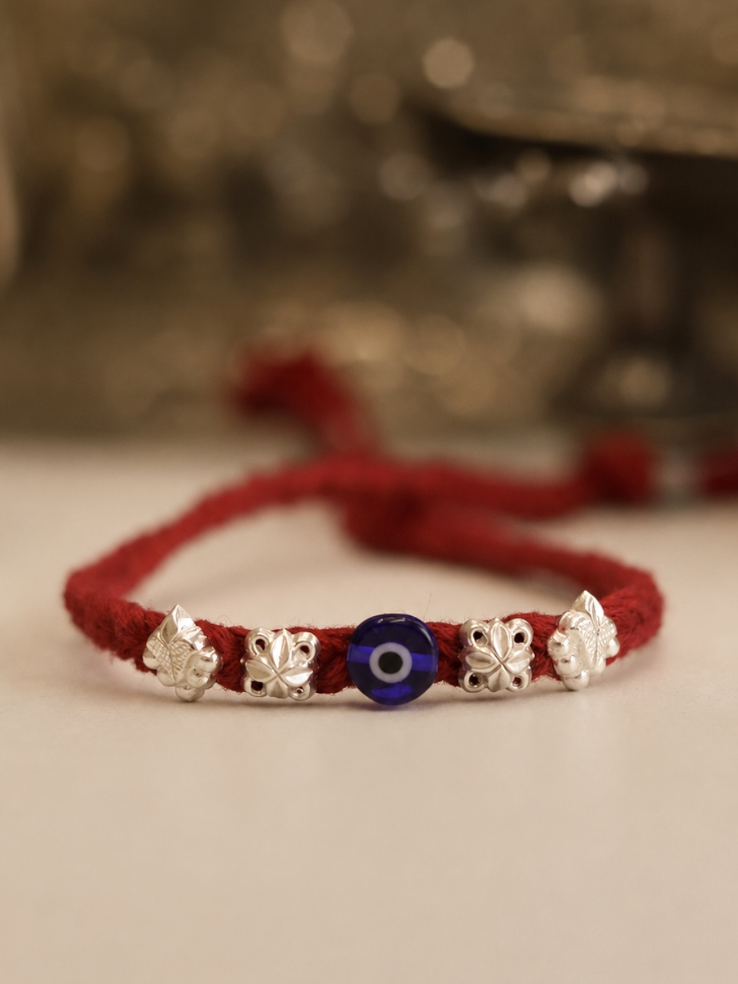 Antique Evil-Eye Luxury Silver 92.5 Bhai Rakhi